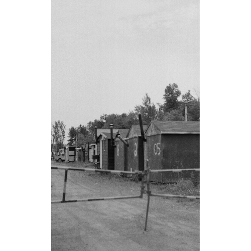 Black and white prints: small houses of indigenous people